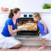 Mother and Daughter Baking Cake - Baker Appliance And Refrigeration Service In Yorktown, VA
