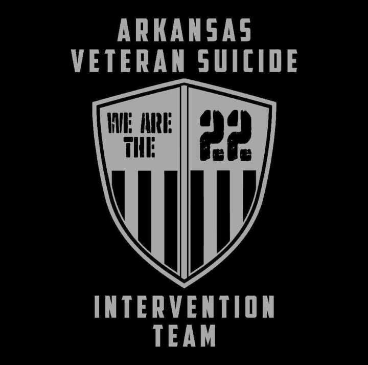Black shield logo reading “Arkansas Veteran Suicide Intervention Team” with “We Are The” and “??” inside.