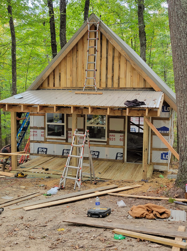 A Small House Is Being Built In The Middle Of A Forest - Owingsville, KY - Withrow Builders