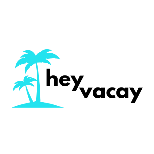 A logo for a company called hey vacay 