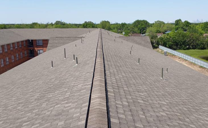 The roof of a building with a lot of shingles on it.