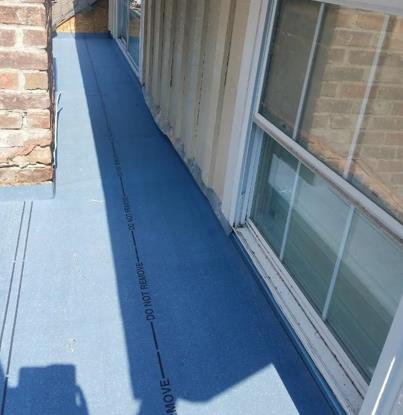 A blue carpet with the words do not leave on it