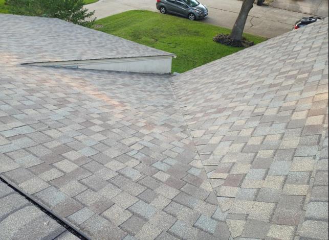 A roof with a car parked on the side of it.
