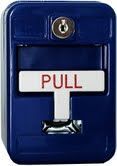 A blue pull button with a key on it.