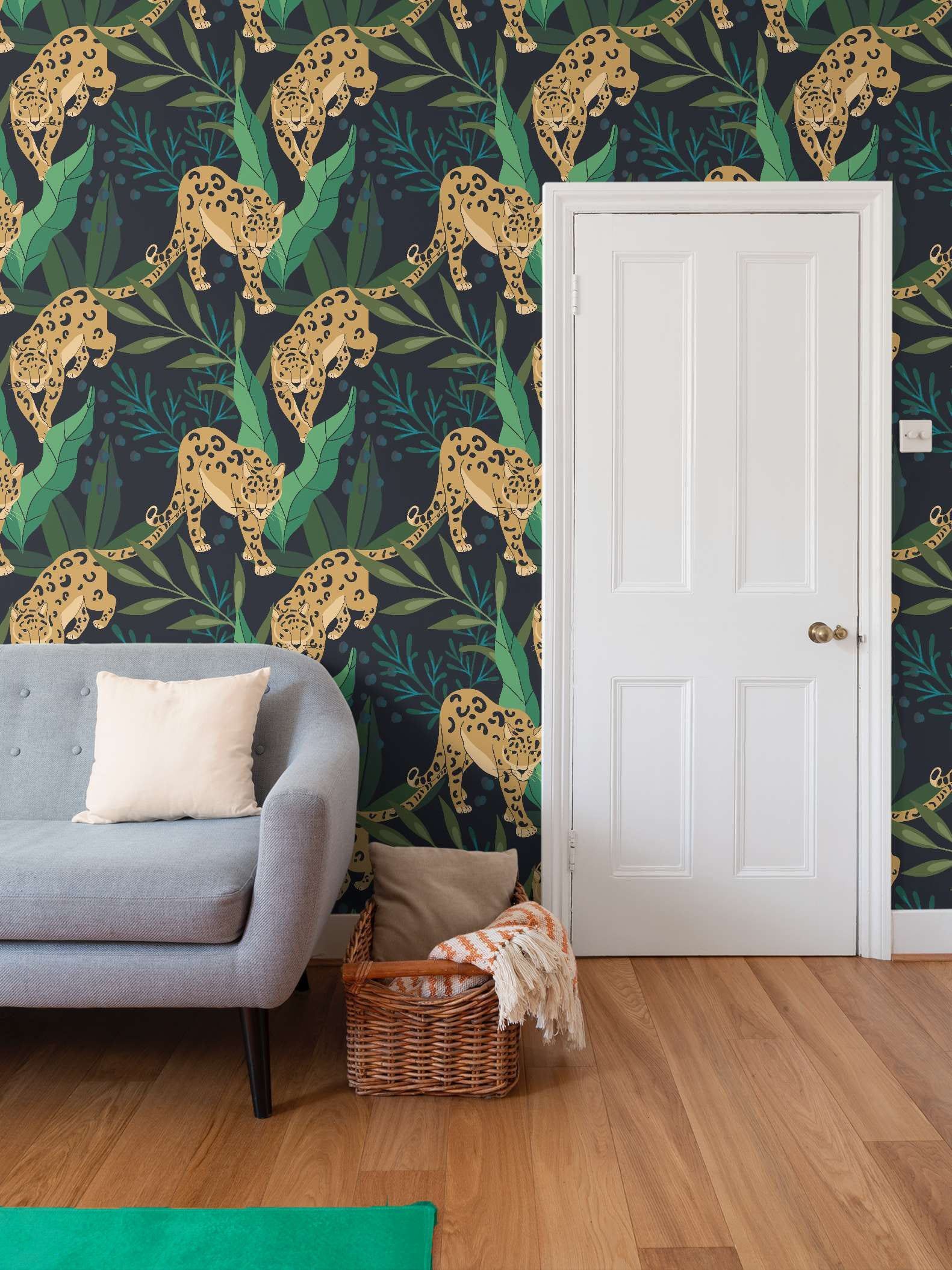 Jaguar wallpaper in a living room. This wallpaper was created by Heartspace Designs to represent a deep and edgy theme as well as represent Jacksonville and the home team Jaguars.