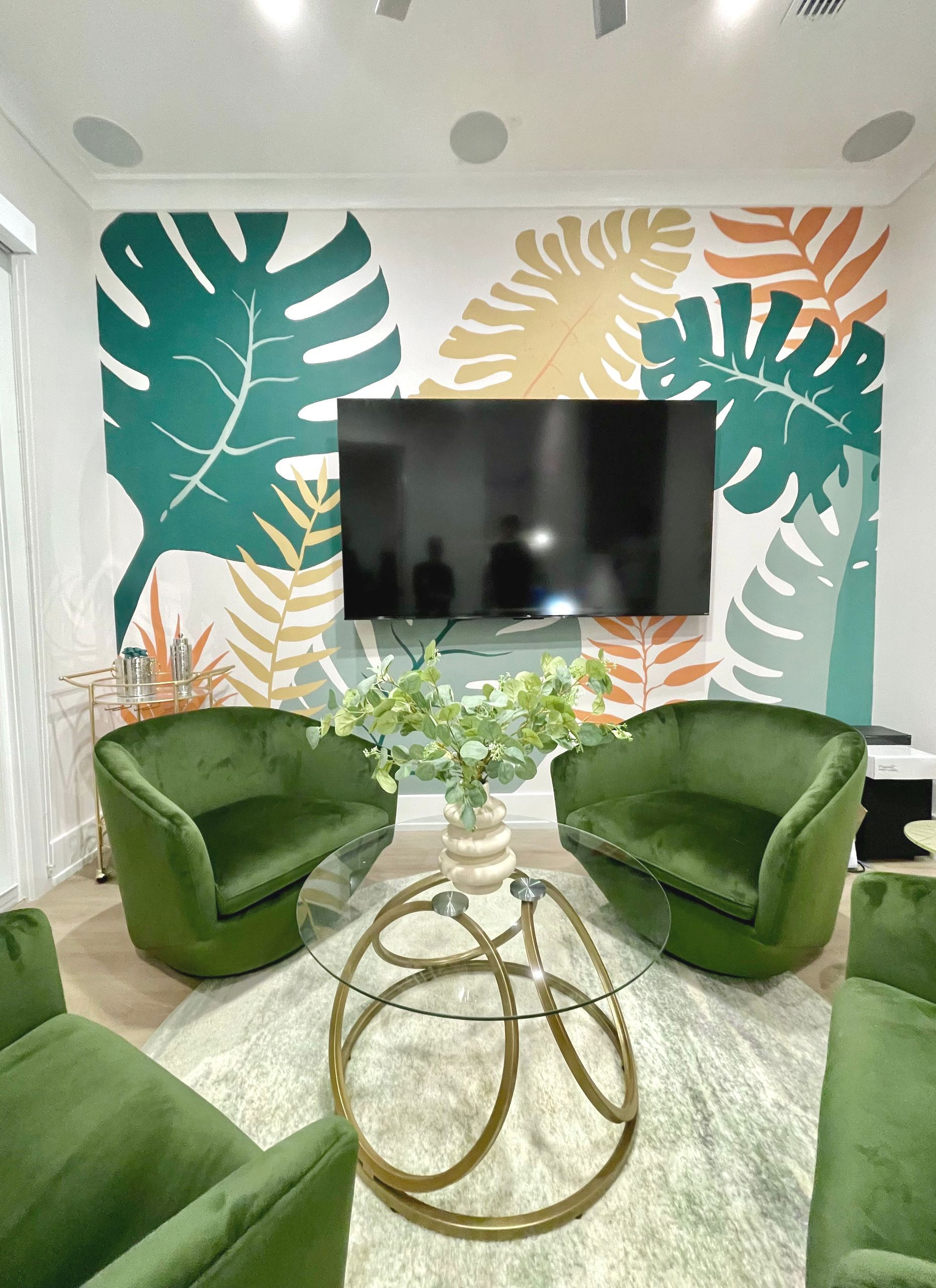 Jungle leaves accent wall in the den room at the Waterway Stay Short term rental/Airbnb, Palm Coast, Florida.