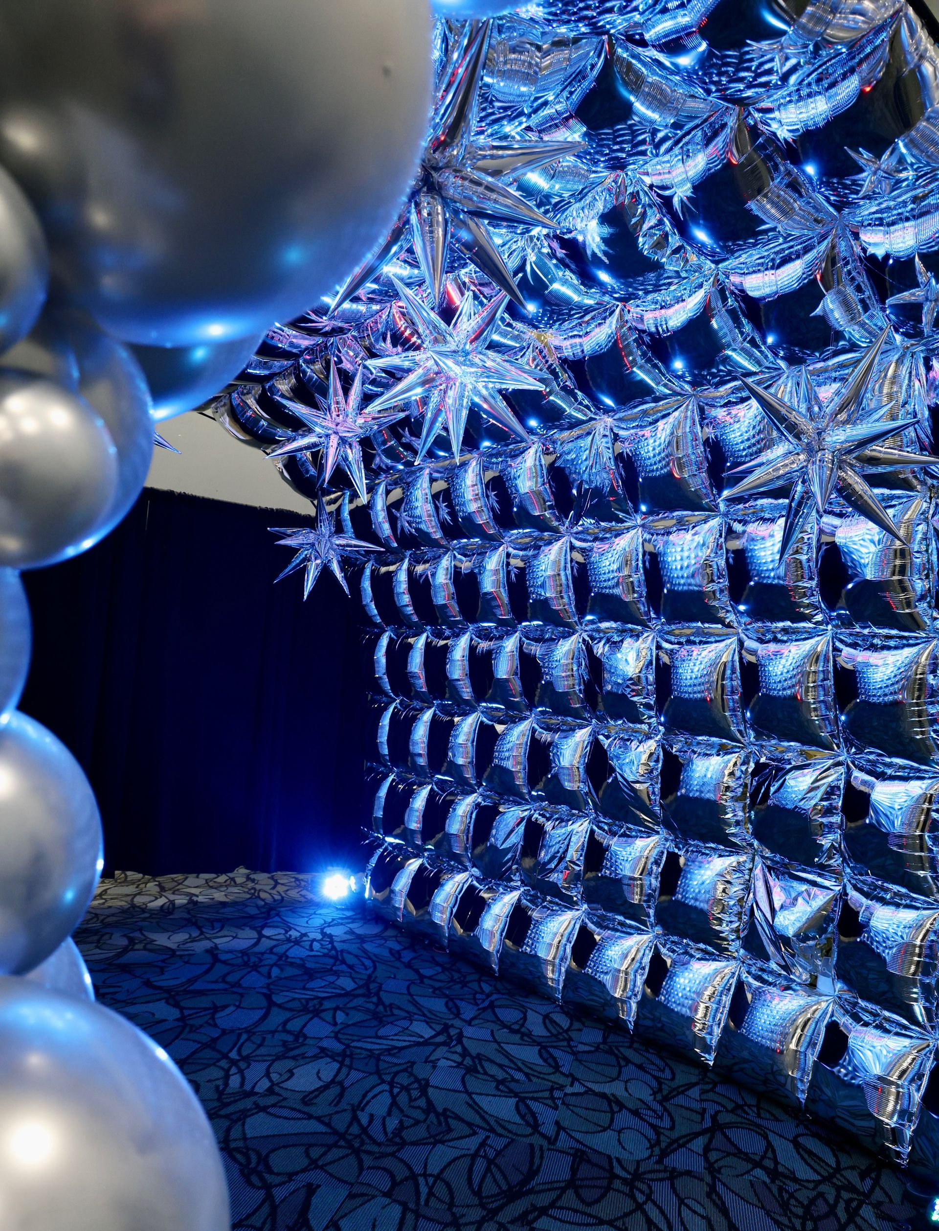 A blue and silver wrapped item is on a table