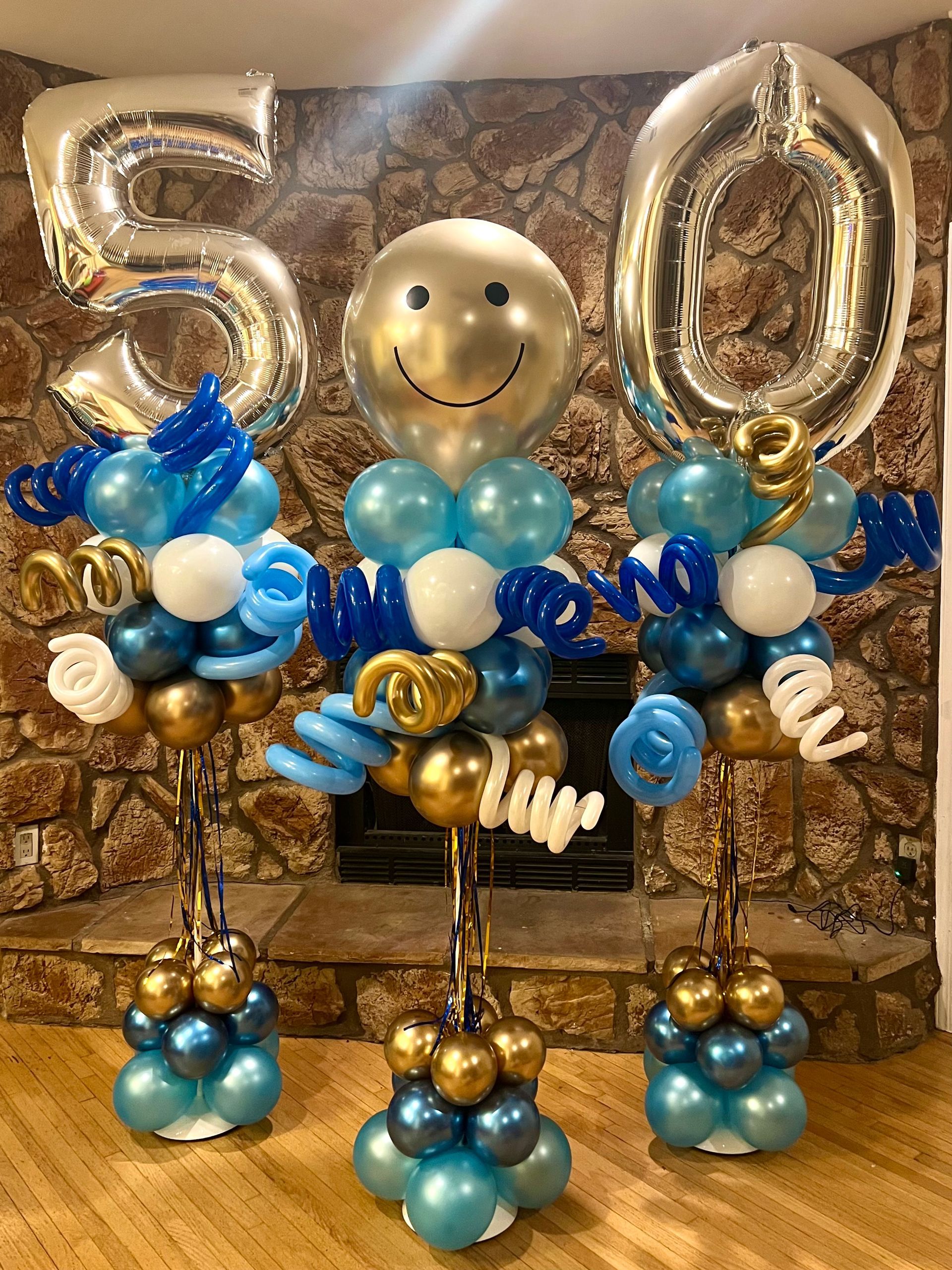 A bunch of balloons are sitting on top of each other in a room.