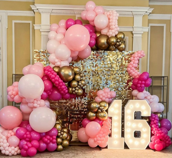 Pink and gold balloon arch and 