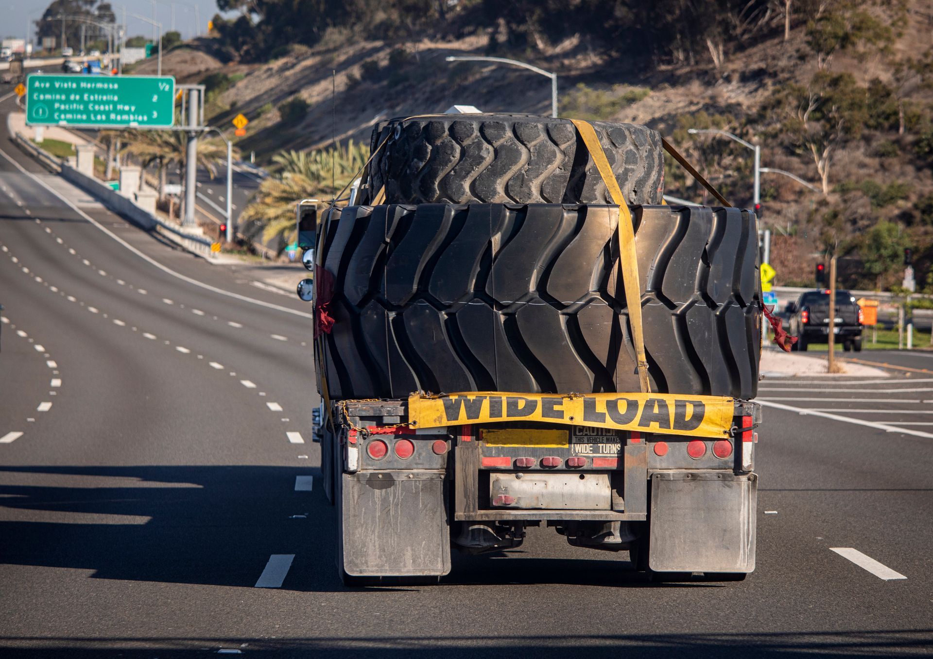 Interior room under construction with drywall installed and boxes on the concrete floor.