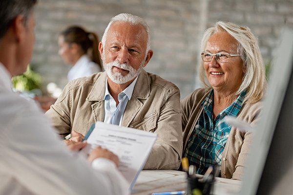 Senior Couple On A Meeting — St. Louis, Missouri — Opulence Estate Solutions
