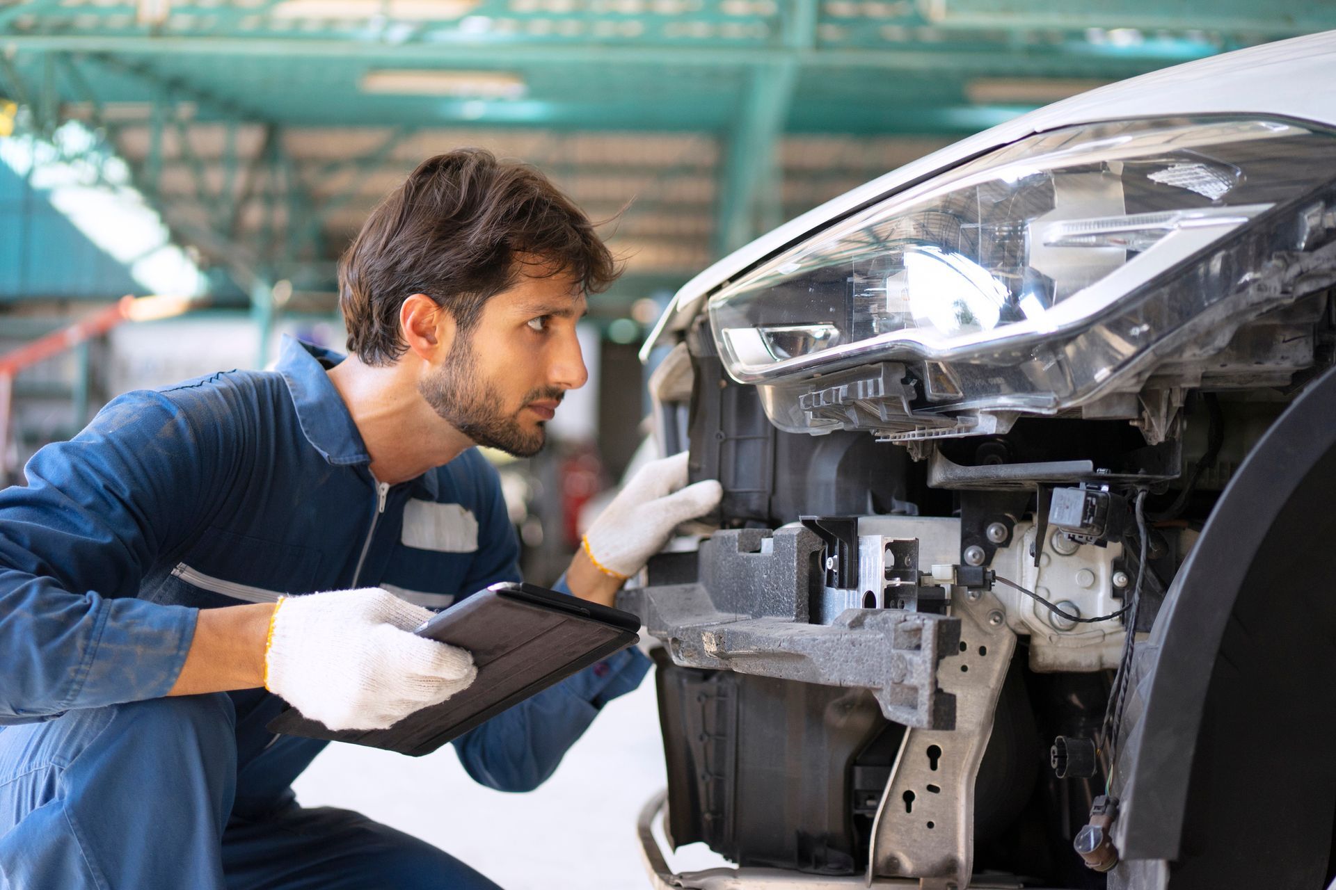 Worker Inspecting the Front of Car | Sumner, WA | Gas and Diesel LLC