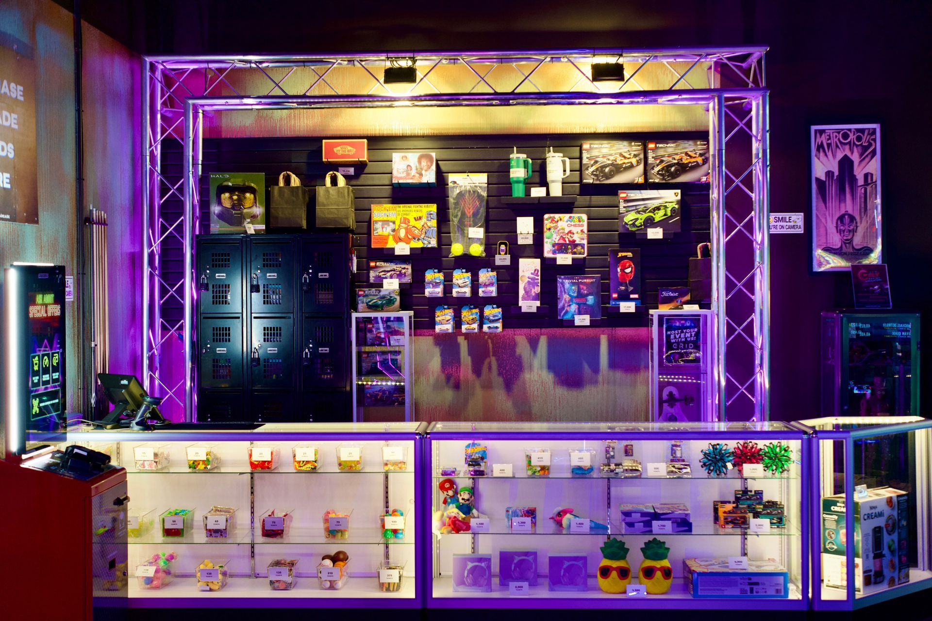 Arcade redemption prize counter at GRID Arcade in Pleasant Grove Utah featuring toys gadgets and sports equipment