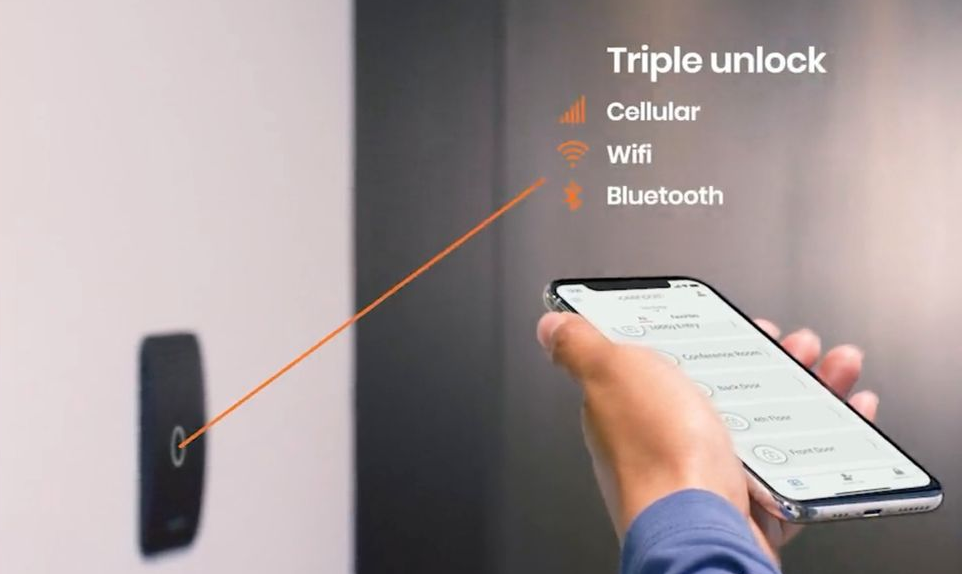 Security camera showing a masked person in a room, highlighted by a red box.