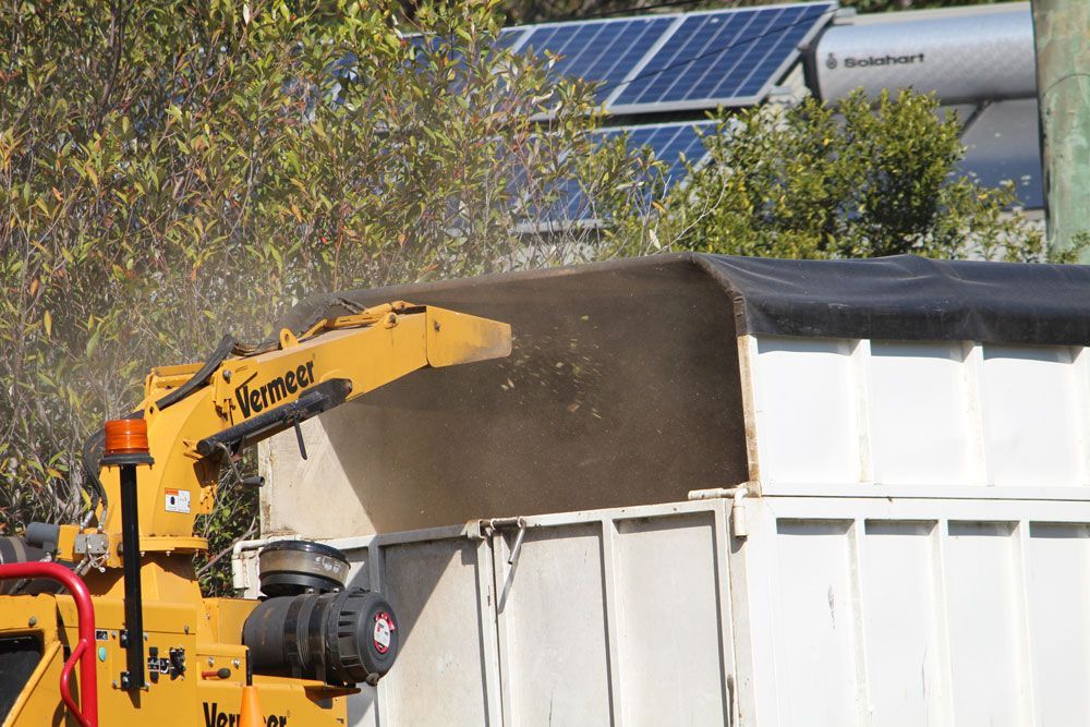 A Yellow Truck with The Word Verner on It — Hayden Tree Service In Morisset, NSW