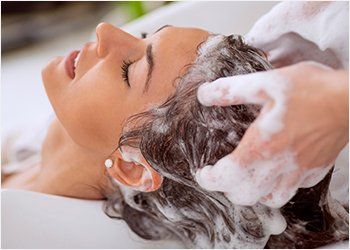 Beauty Spa — Woman Getting Shampooed in Concord, NC