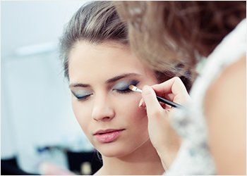 Beauty Care — Woman Putting Makeup in Concord, NC