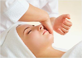 Beauty Spa Services — Woman Getting Facial in Concord, NC