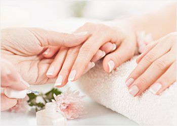 Nail Care — Woman Getting Nails Done in Concord, NC