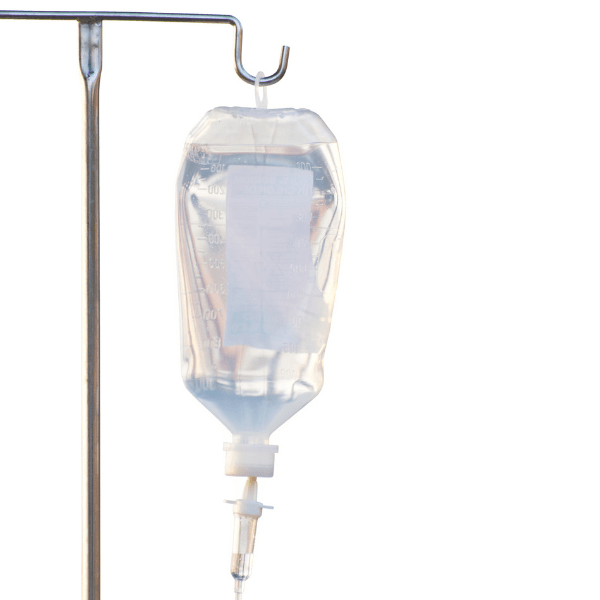 A bottle of water is hanging from a metal pole.