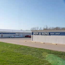 Shop exterior on a sunny day. | Don & Sons Body Shop