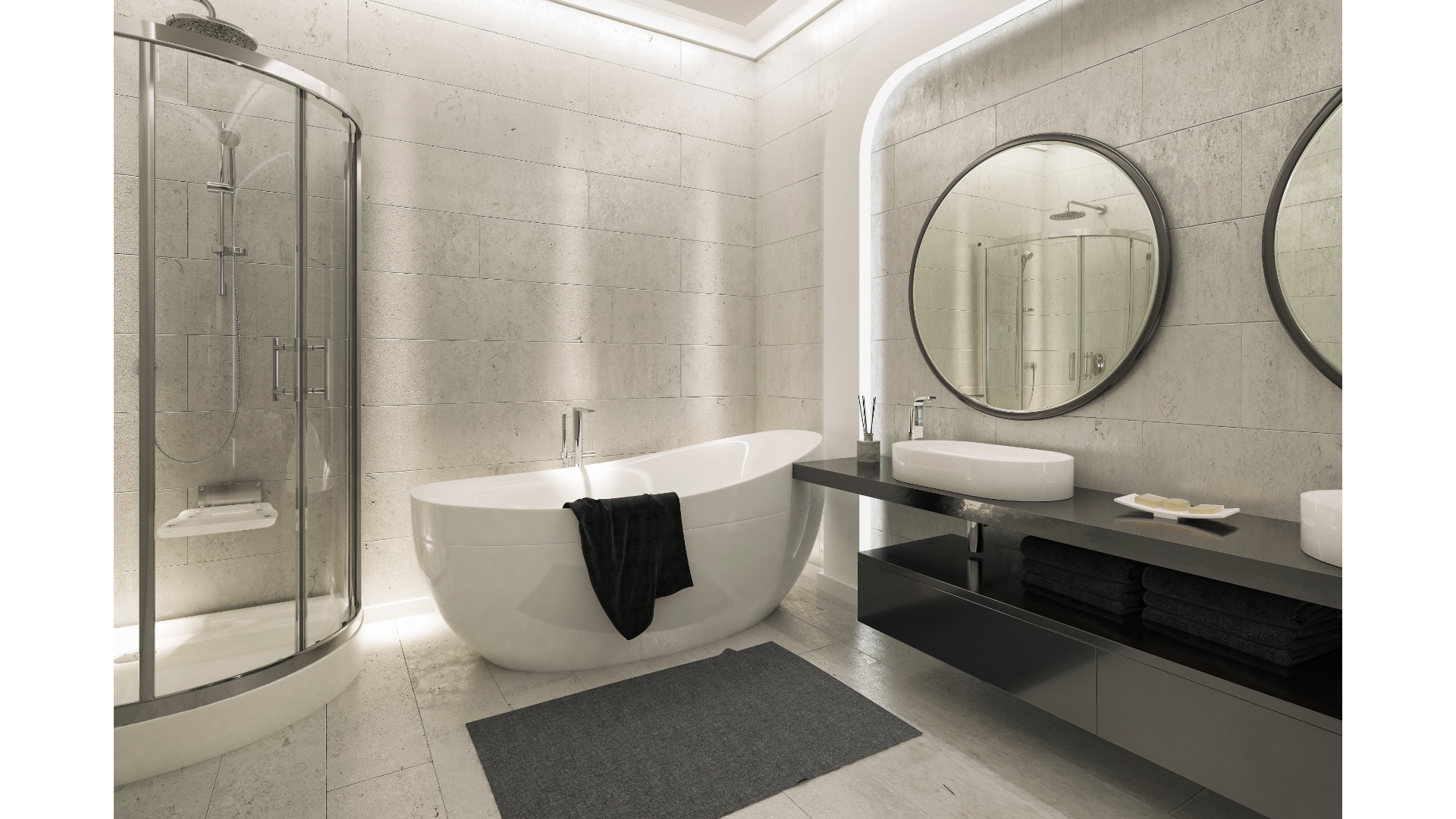 Une salle de bain avec baignoire, lavabo, douche et miroirs.