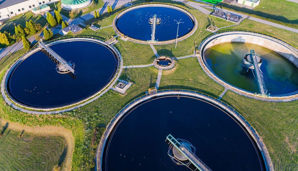 An Aerial View Of A Sewage Treatment Plant With A Lot Of Circles Of Water — Eureka Water & Filtration In Mount St John, QLD