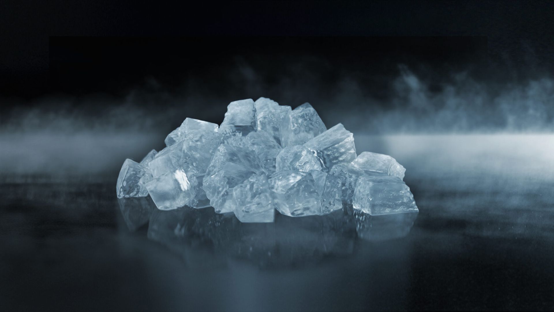 A Pile Of Ice Cubes Is Sitting On A Table With Smoke Coming Out Of It — Eureka Water & Filtration In Mount St John, QLD