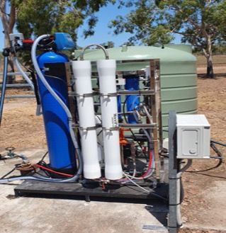 A Blue Tank With A Hose Attached To It — Eureka Water & Filtration In Mount St John, QLD