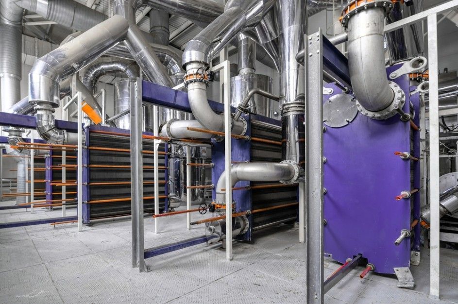 Row of purple pipes lined up in a factory — Water Filtration Systems in Cairns, QLD