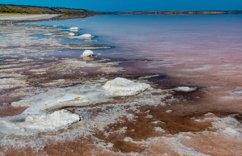 Body of water with a lot of salt on the shore— Water Filtration Systems in Mount Isa, QLD