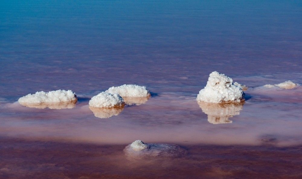 Few pieces of salt are floating in the water — Water Filtration Systems in Mackay, QLD