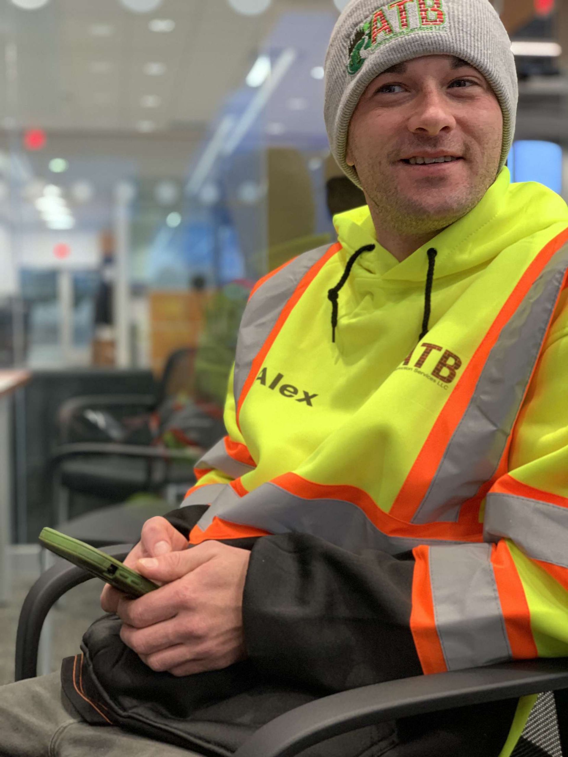 A dirt road in the middle of a forest with trees on both sides. mulch