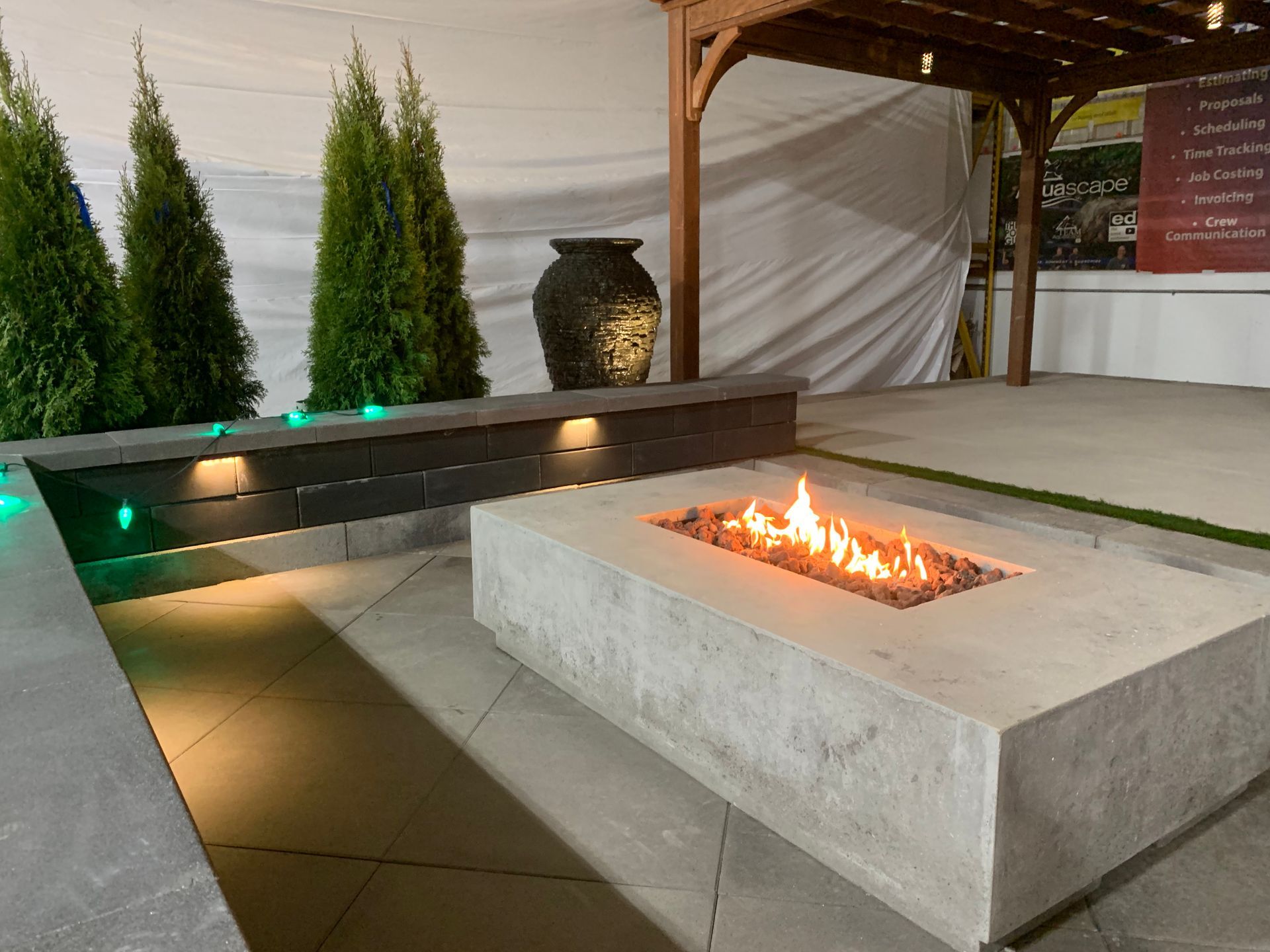 There is a fire pit in the middle of the patio.