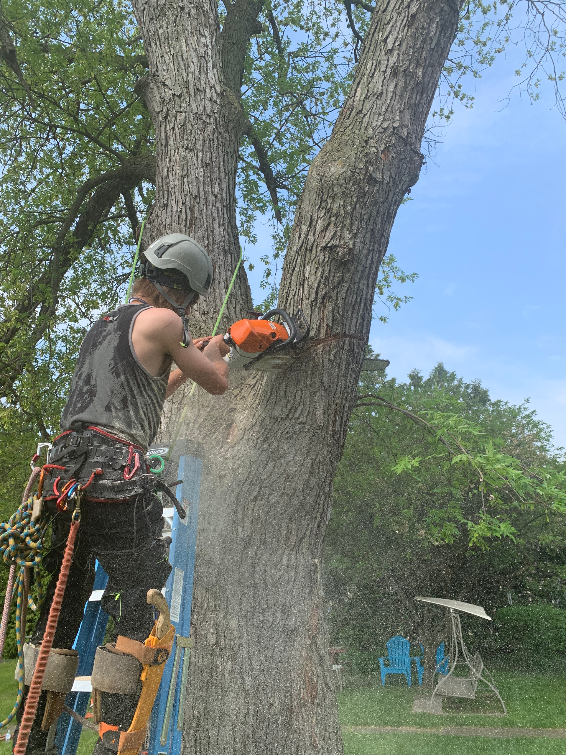 A house with a patio in front of it is being built. brick paver patio