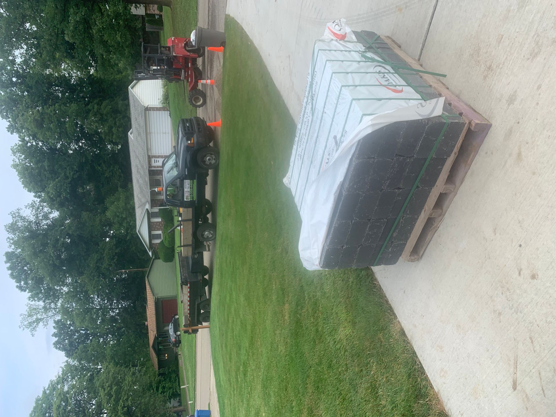 There is a fire pit in the middle of the yard. outdoor living.