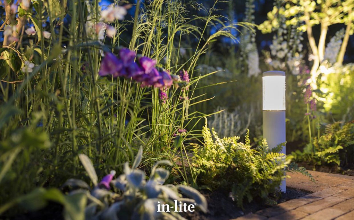 There is a fire pit in the middle of the room. lights