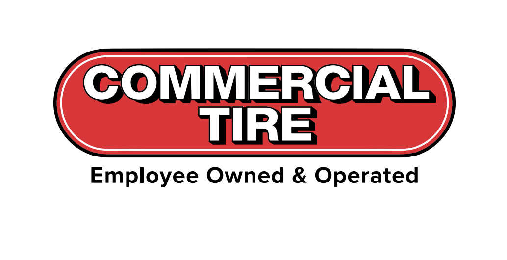 The logo for commercial tire is red and black and says employee owned and operated.