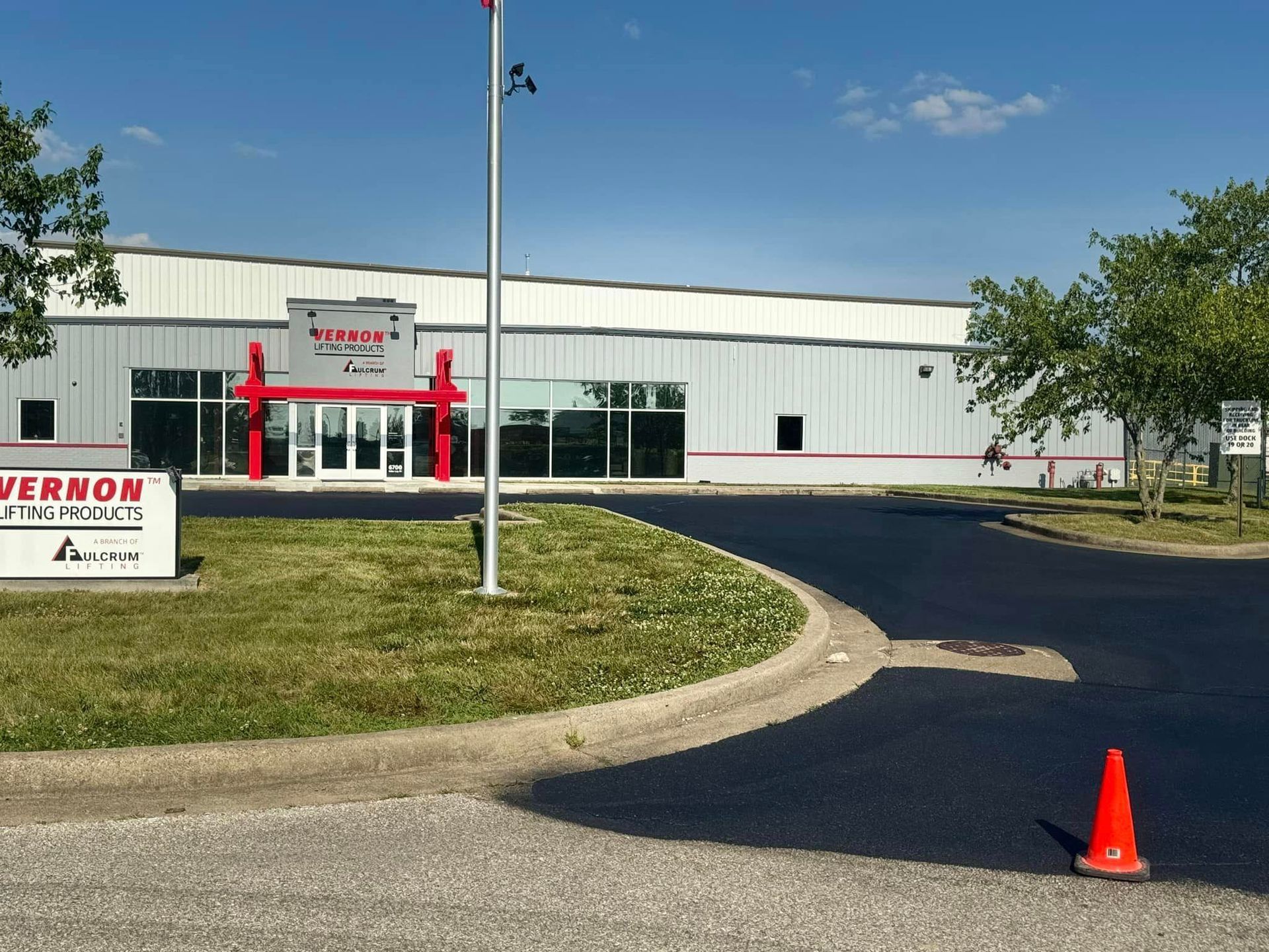 A large building with a sign that says vernon fire products