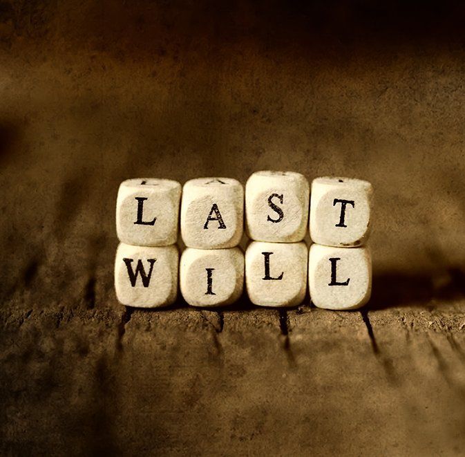 The Word Last Will is Written on a Wooden Surface — Paton Hooke Lawyers & Conveyancers In Taree, NSW