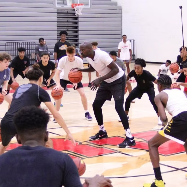 Diverse young male and female basketball players ages 10 to 21 training at Skill at Will Hoops camps in Los Angeles