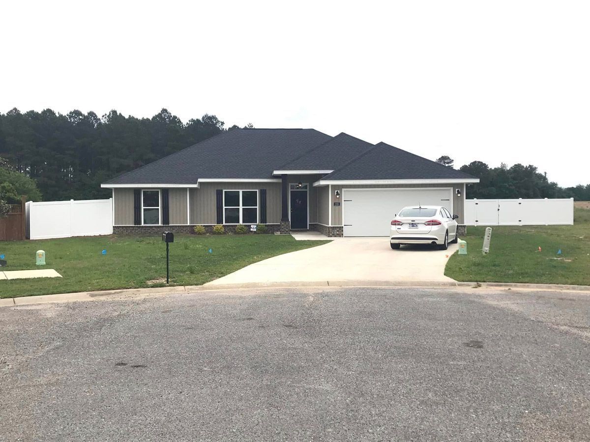 Modern House with Car — Atmore, AL — Mills Fence LLC
