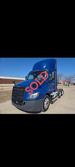 Blue semi-truck with 