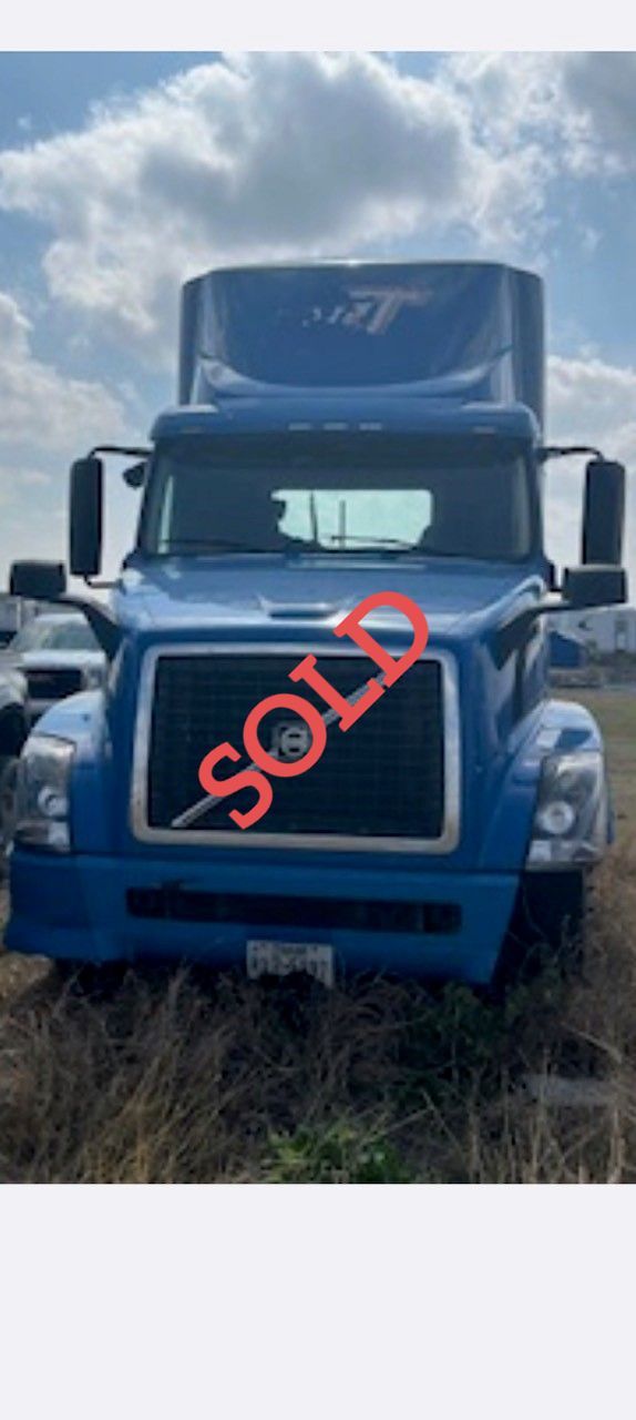 Blue semi-truck with 