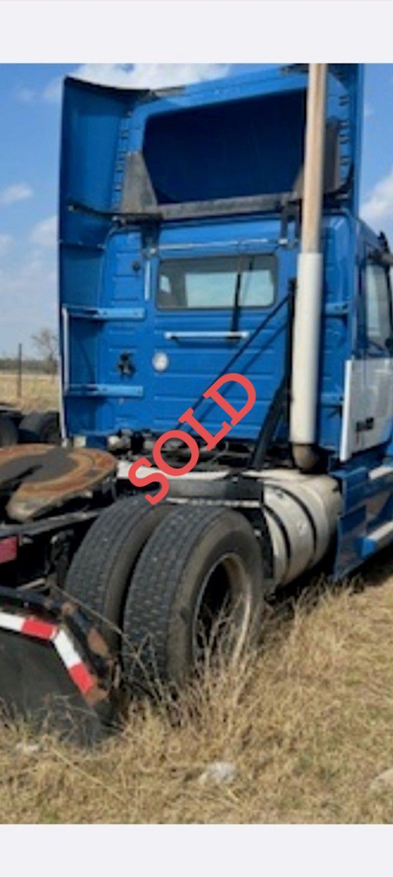 Rear view of a blue semi-truck, 