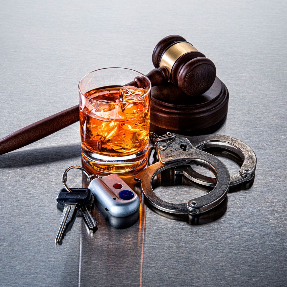 Alcohol, Handcuffs, Keys, and Gavel — Lakeport, CA — William Conwell, Esq.