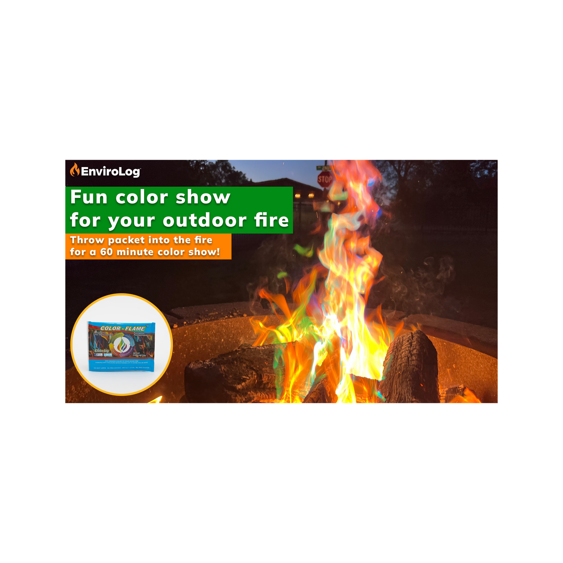 Fire ablaze with colorful flames from a product package thrown into an outdoor fire pit.