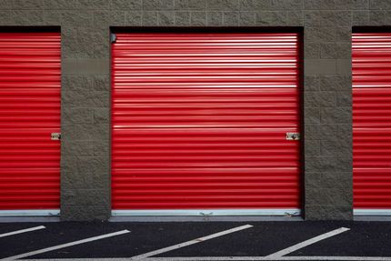 Storage unit with red doors — Daytona, FL — A Place for Your Stuff