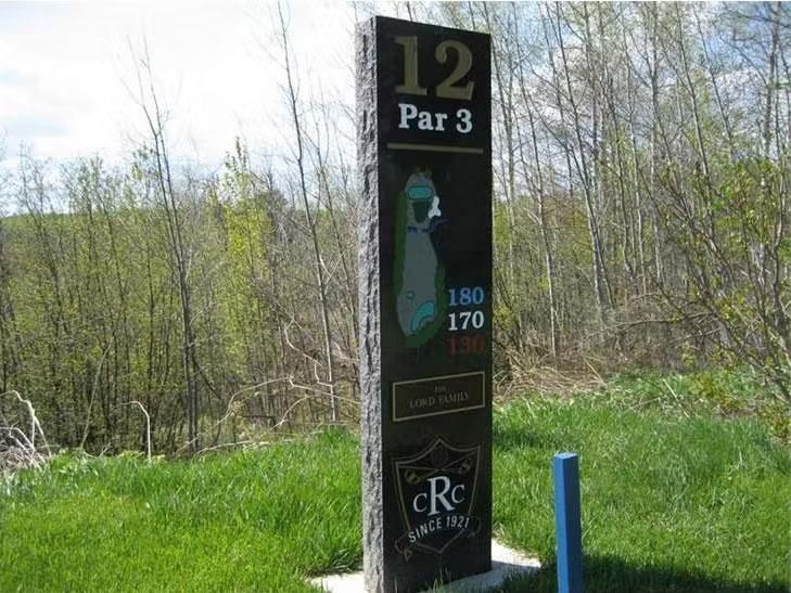 A sign for par 3 of a golf course