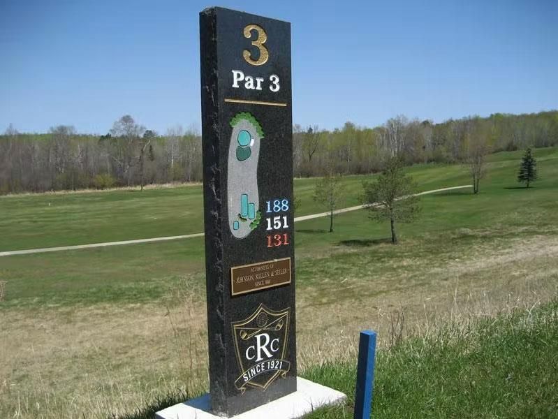 A sign for par 3 of a golf course
